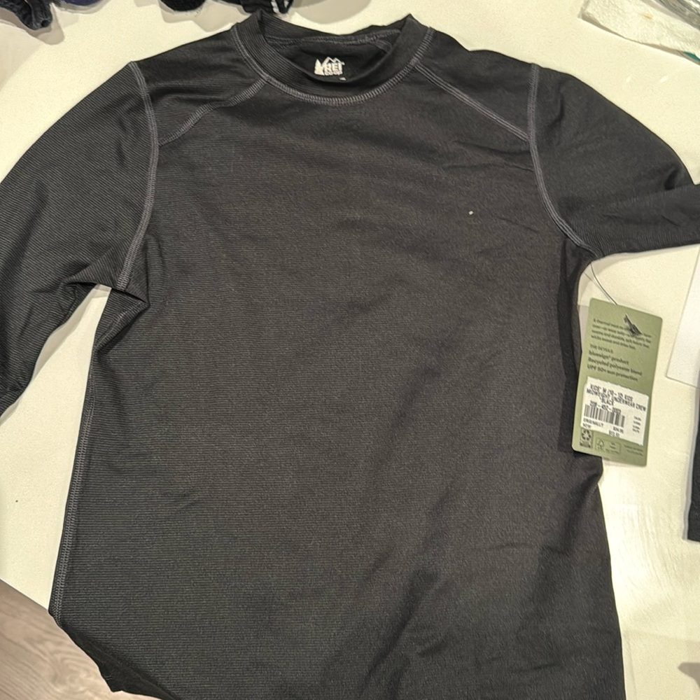 Kids brand new REI thermal underwear crew shirt.